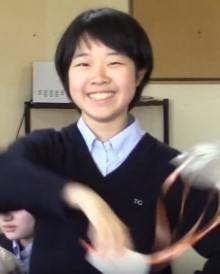 Happy student studying in a High School Preparation class at AICOL