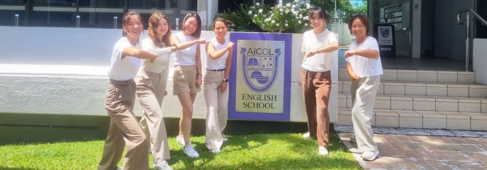 Happy and friendly AICOL staff. There is no uniform!