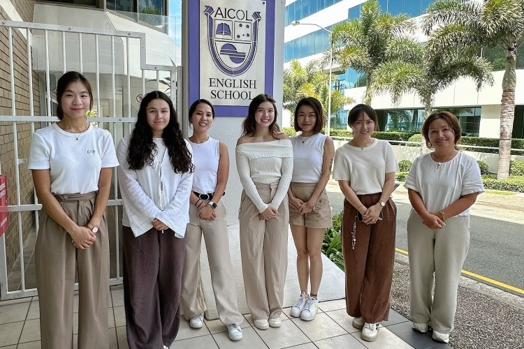 AICOL team members waiting to welcome Winter Camp students